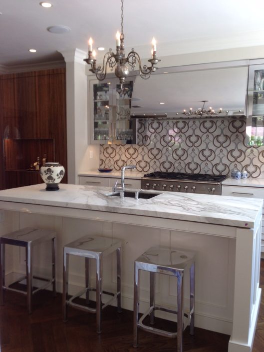 A kitchen with a sink and a counter