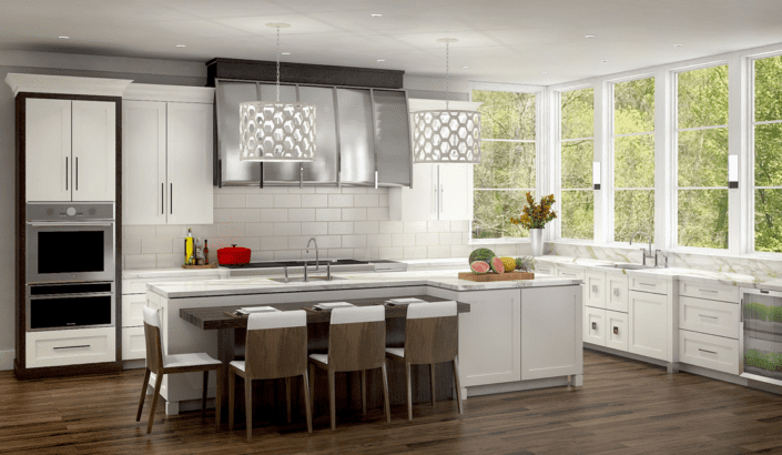 A kitchen with white cabinets and wooden floors.