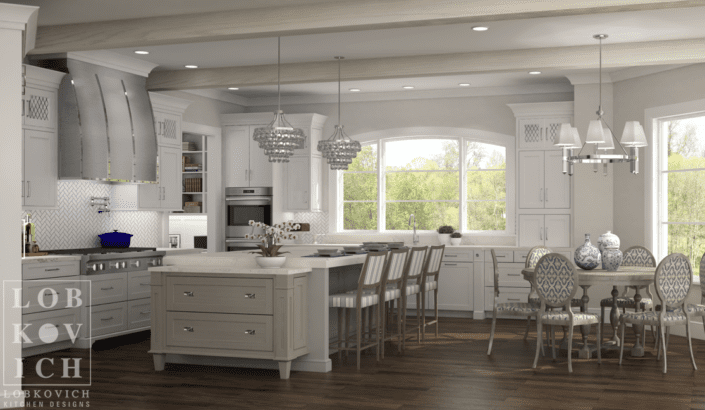 A kitchen with white cabinets and wooden floors.