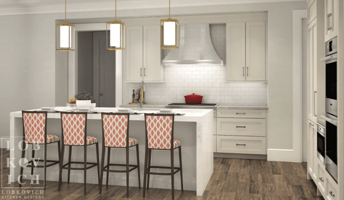 A kitchen with white cabinets and pink chairs.