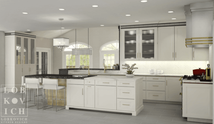 A kitchen with white cabinets and black counter tops.